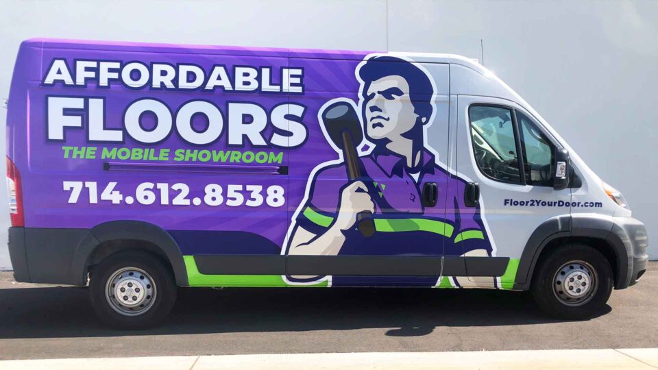 Purple, geen and black partial Promaster wrap featuring man with hammer for Affordable Floors