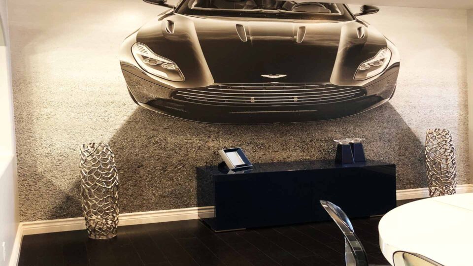 black and white wall graphic with front of Bentley car