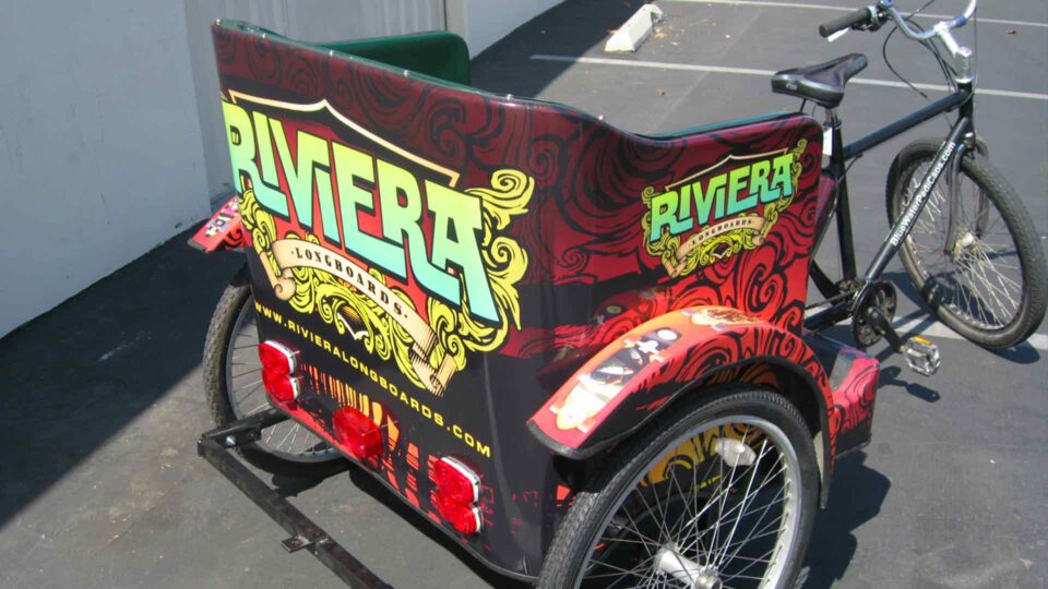 Bicycle with colorful vinyl rickswaw wrap for Riviera Skateboards.