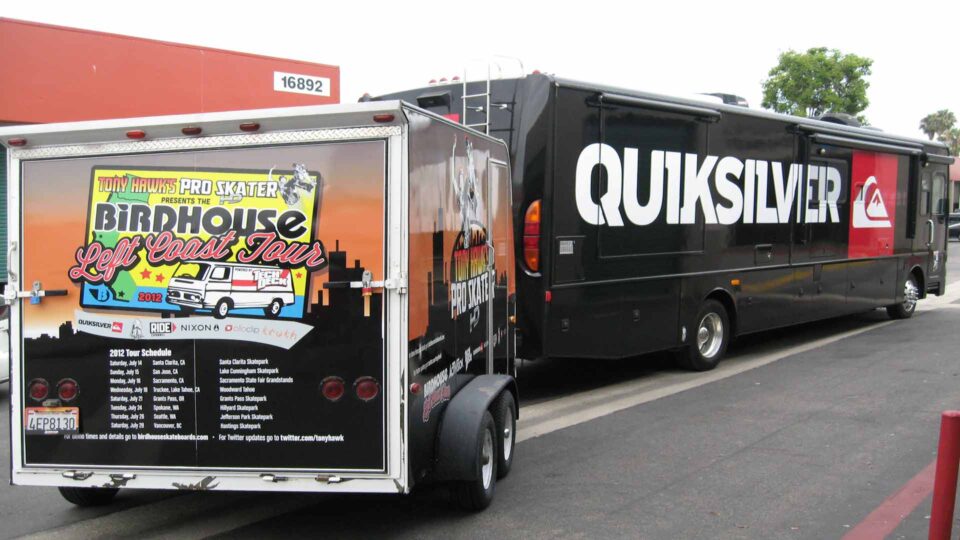 Enclosed trailer with graphics promoting upcoming Skateboard Tour Schedule