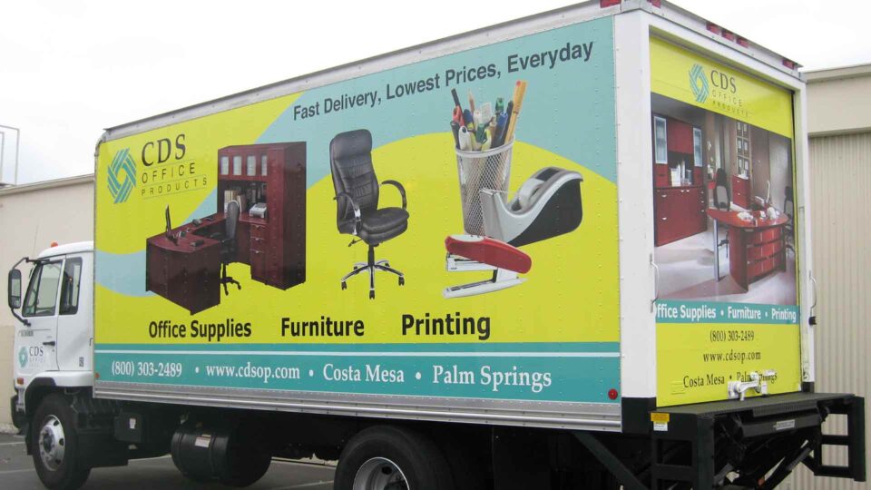 Box Truck wrap showing images of office furniture and supplies for CDS Office Products
