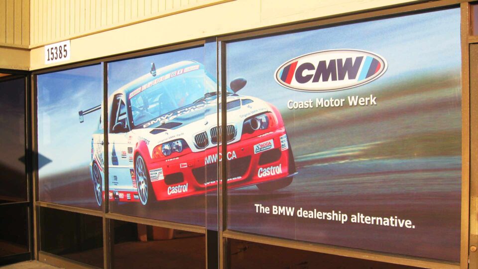 Solid Vinyl Window Graphics for Coast Motor Werk featuring a BMW racing