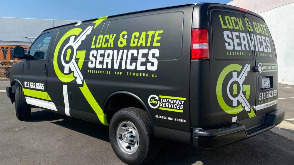 Matte black chevy express wrap with white and green die cut decals for Lock & gate services