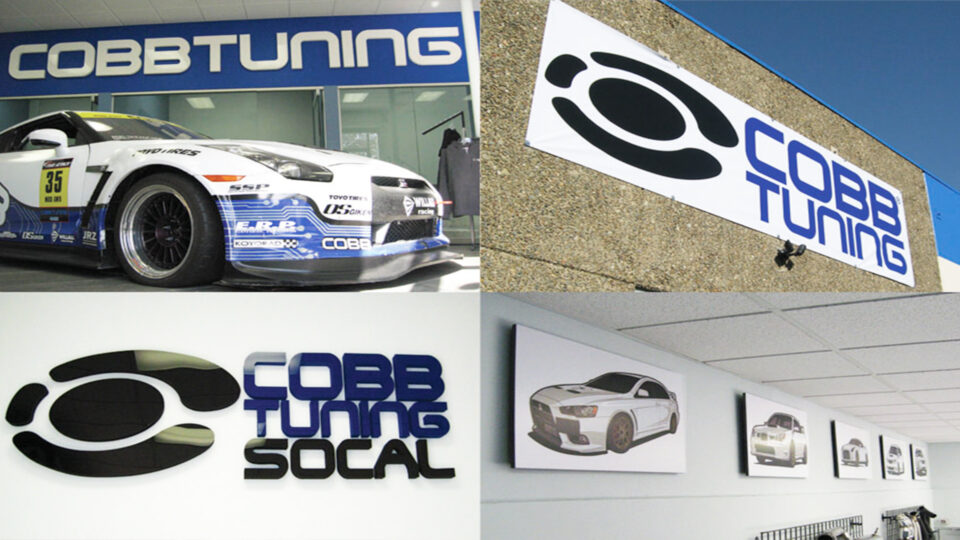 Building with white banner. Inside of building with COBB TUNING sign on top of showroom.