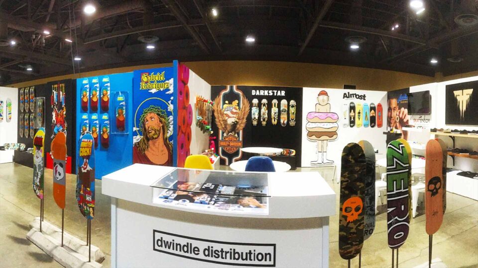 Colorful trade show booth vinyl graphics featuring Darkstar and Almost Skateboard brands for Dwindle Distriubution