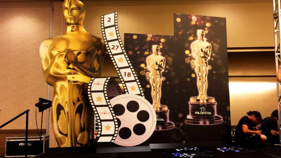 Gold Oscar & film reel die cut gator prints for Prudential special event