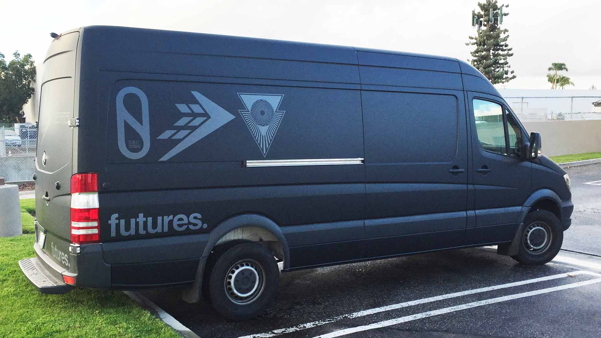 Matte black Sprinter Color Change wrap with black die cut decals