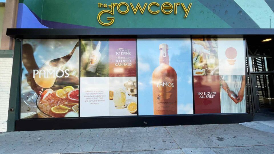 Colorful solid window graphics for The Growcery featuring Pamos alcohol bottle and drinks