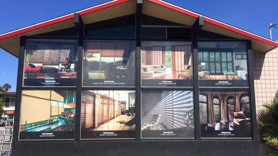 Color perforated window graphics featuring home interiors with Hunter Douglas window coverings
