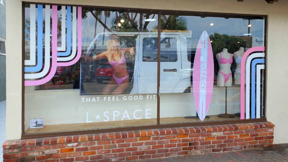 Solid die cut pink, white and blu strip window decals and Lspace Logo