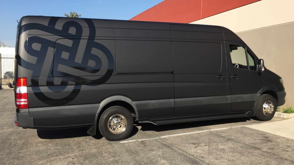 Mercedes Sprinter Matte Black Color Change Vehicle Wrap With Die Cut Decals