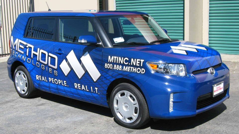 Blue full Scion XB wrap with white Method logo