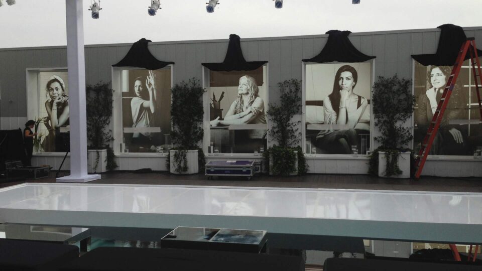 black and white window graphics of actresses for Oscars after party event