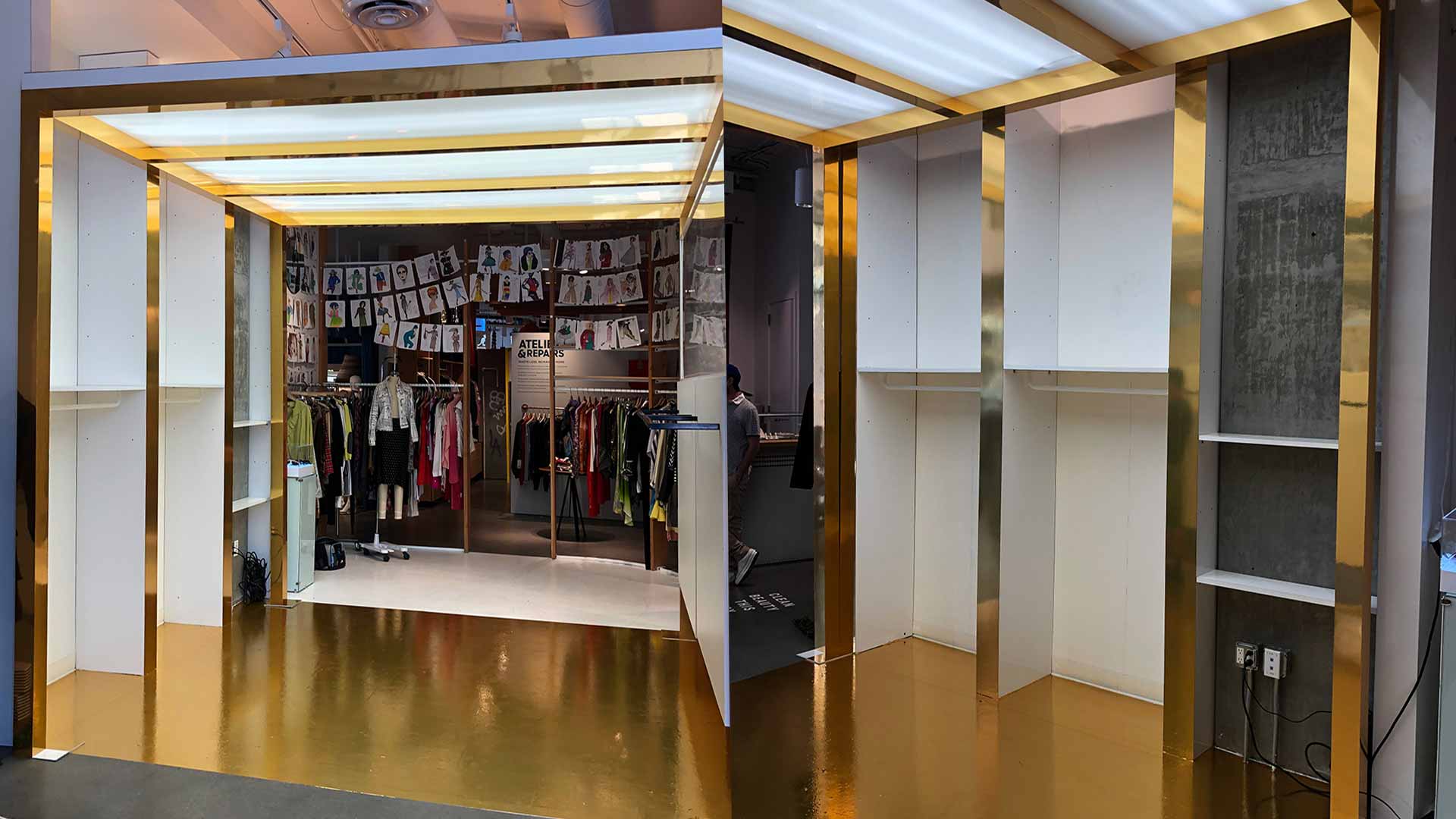 Mirror gold vinyl on floors and trim of walls for retail store.