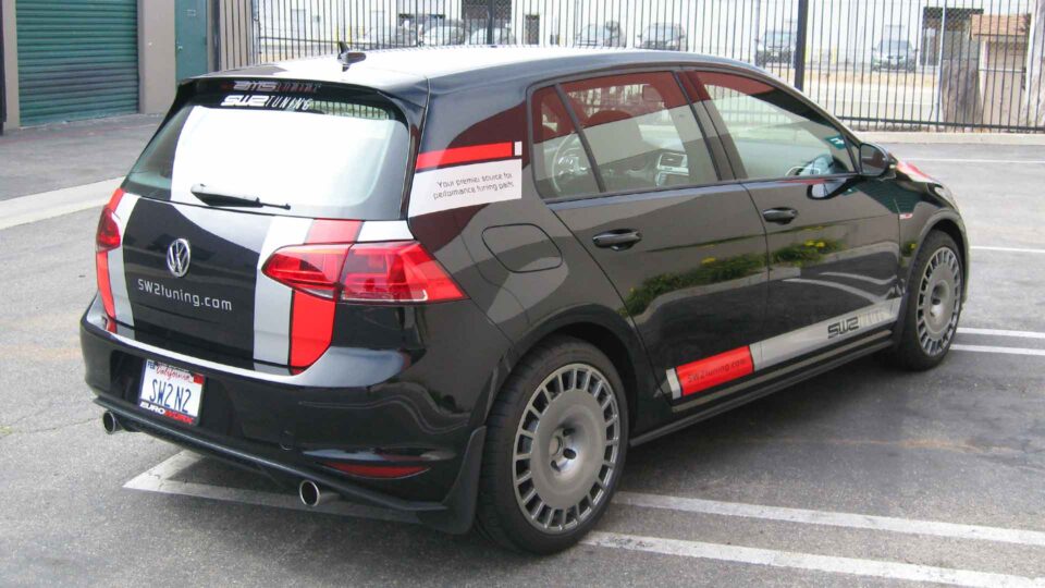 Black VW with red and gray stripe decals and SW2tuning.com