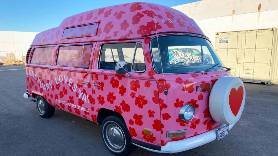 Pink with red flowers full vintage VW bus wrap for Sanctuary Clothing