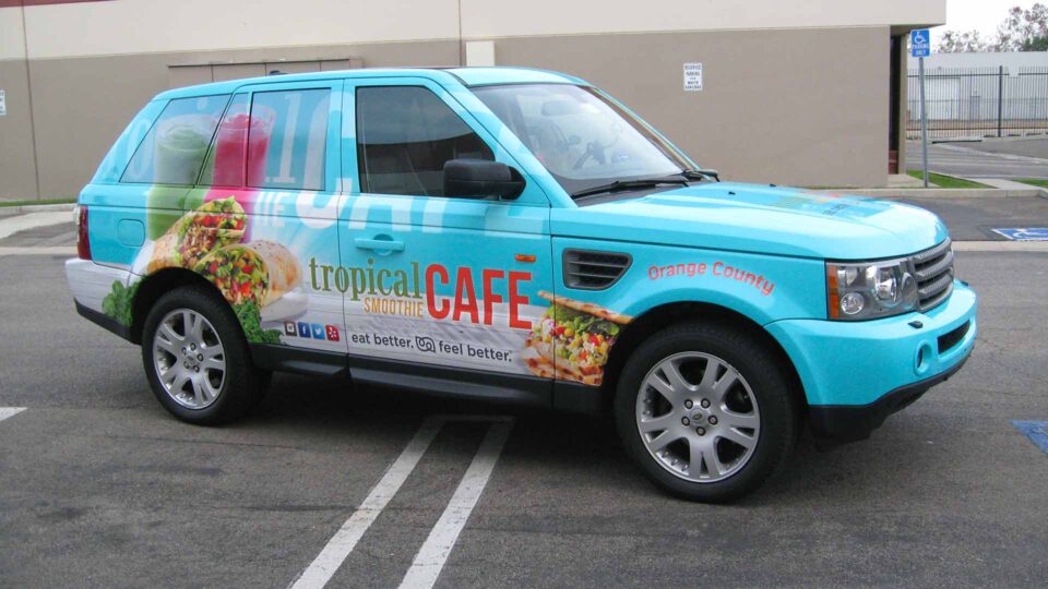 Colorful Blue Landrover wrap with sandwiches and smoothies for Tropical Smoothie Café.