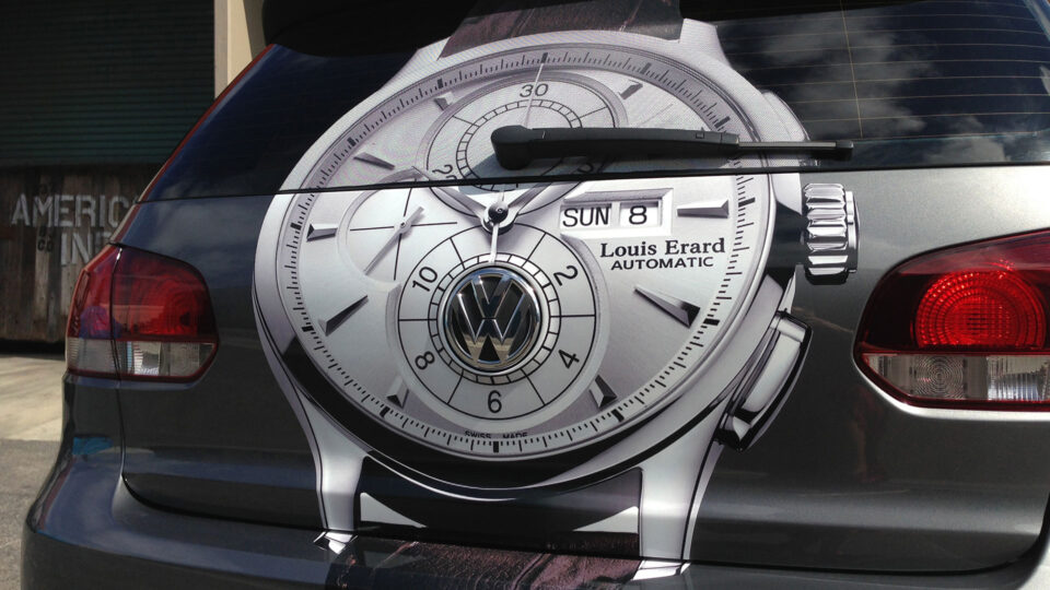 Rear VW vehicle decal featuring a watch face