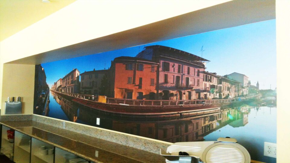 Wall mural featuring red and pink apartments on the canals in Venice, Italy