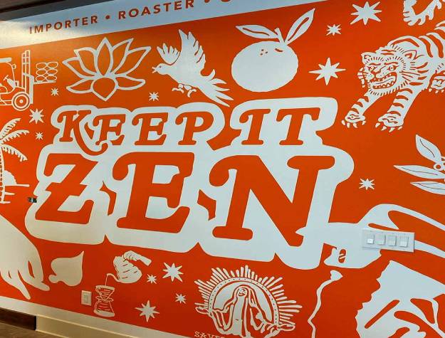 Interior retail wall graphics showing modern illustrative typography