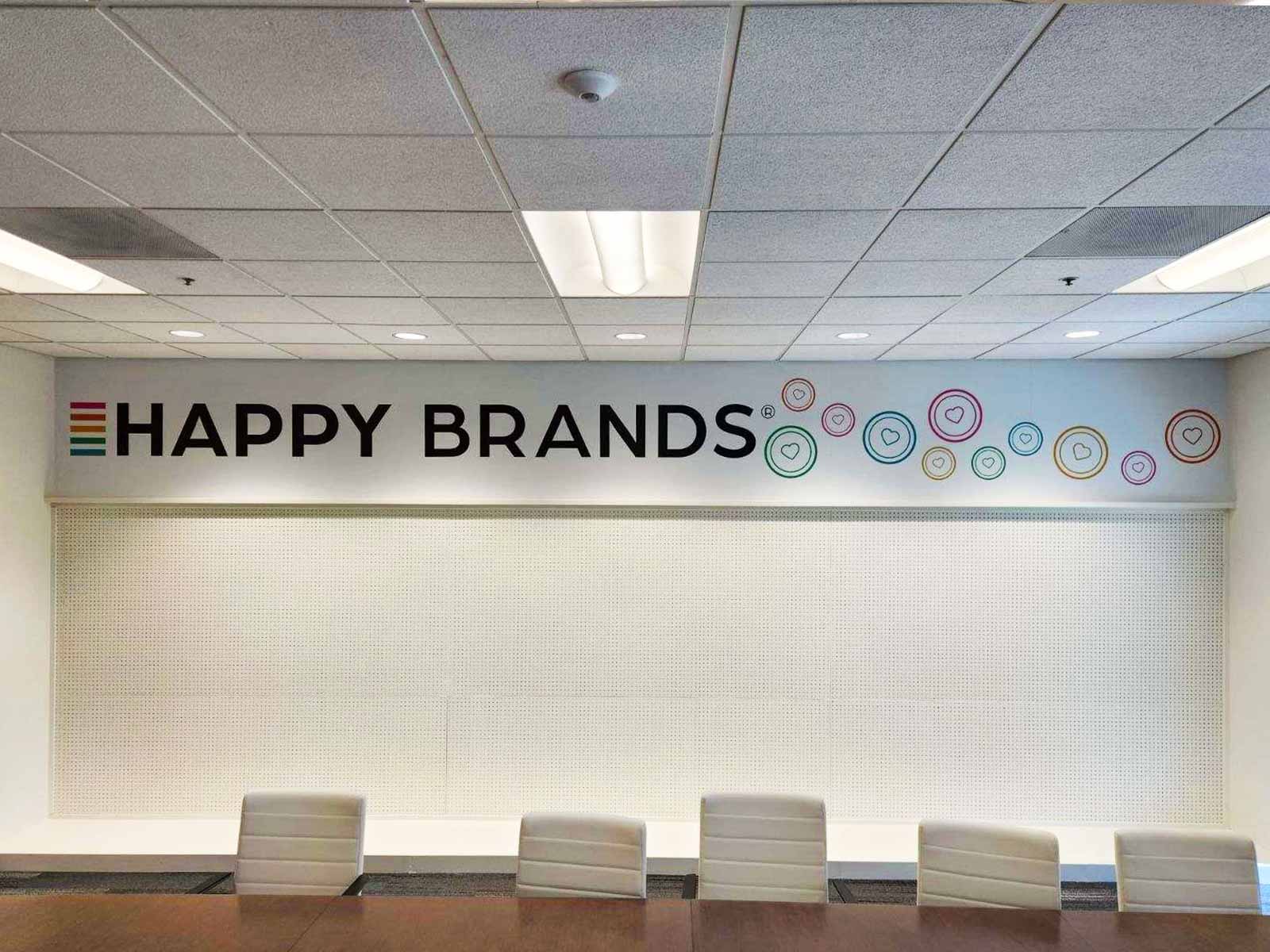 VINYL WALL GRAPHICS AND DIE CUTS FOR HAPPY BRANDS 7 diecut wall install
