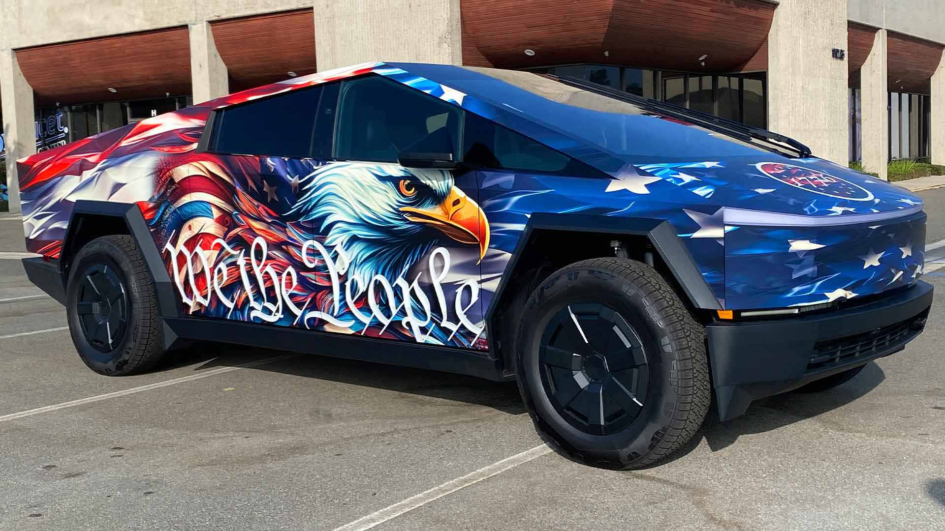 Patriotic Tesla Cybertruck wrap featuring American Flag, Eagle and We The People text