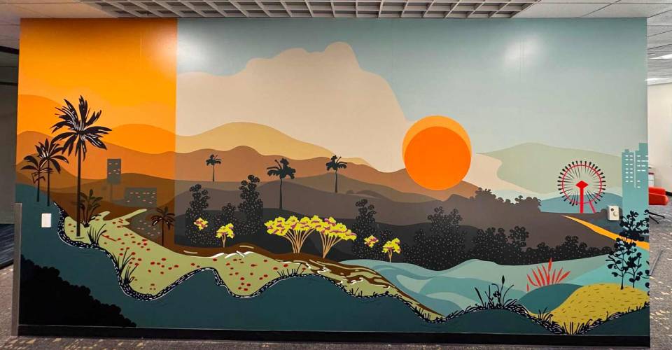 Large format wall graphic with illustrated nature scene