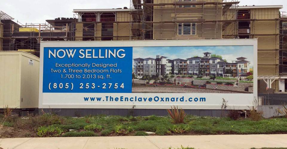 Outside side advertising new apartment building