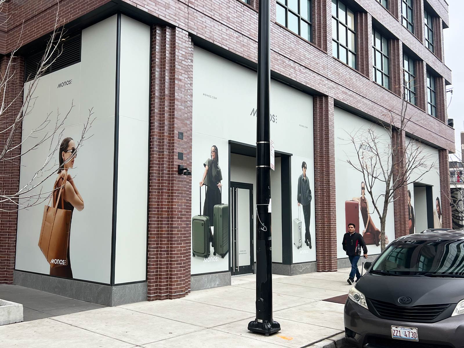 Stunning Success: Massive Vinyl Window Graphics Transform MONOS Stores Nationwide 2 large window vinyl installed chicago