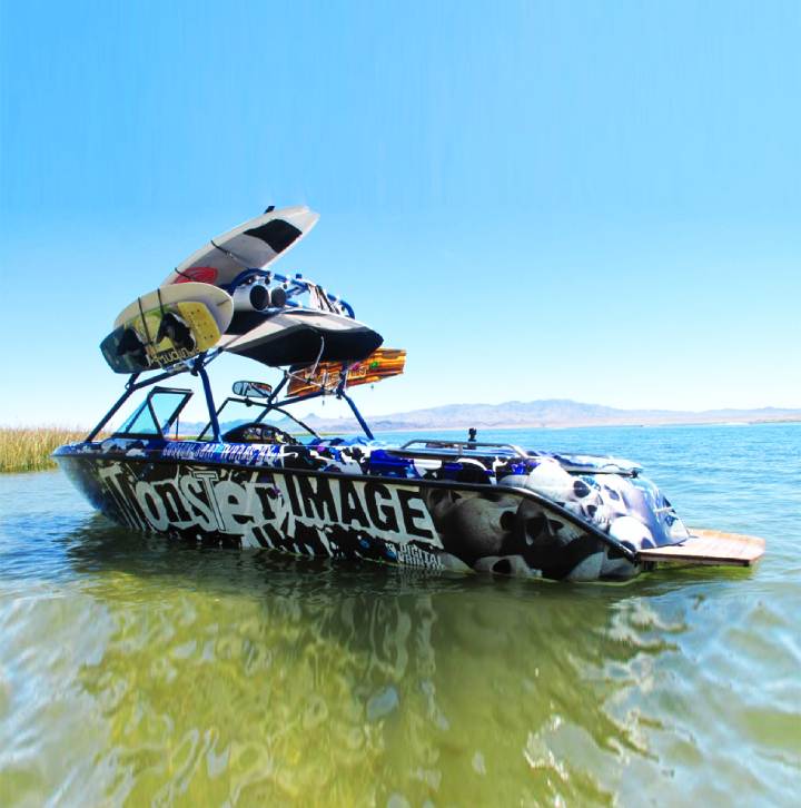 Boat floating on lake wrapped with Monster Image graphics