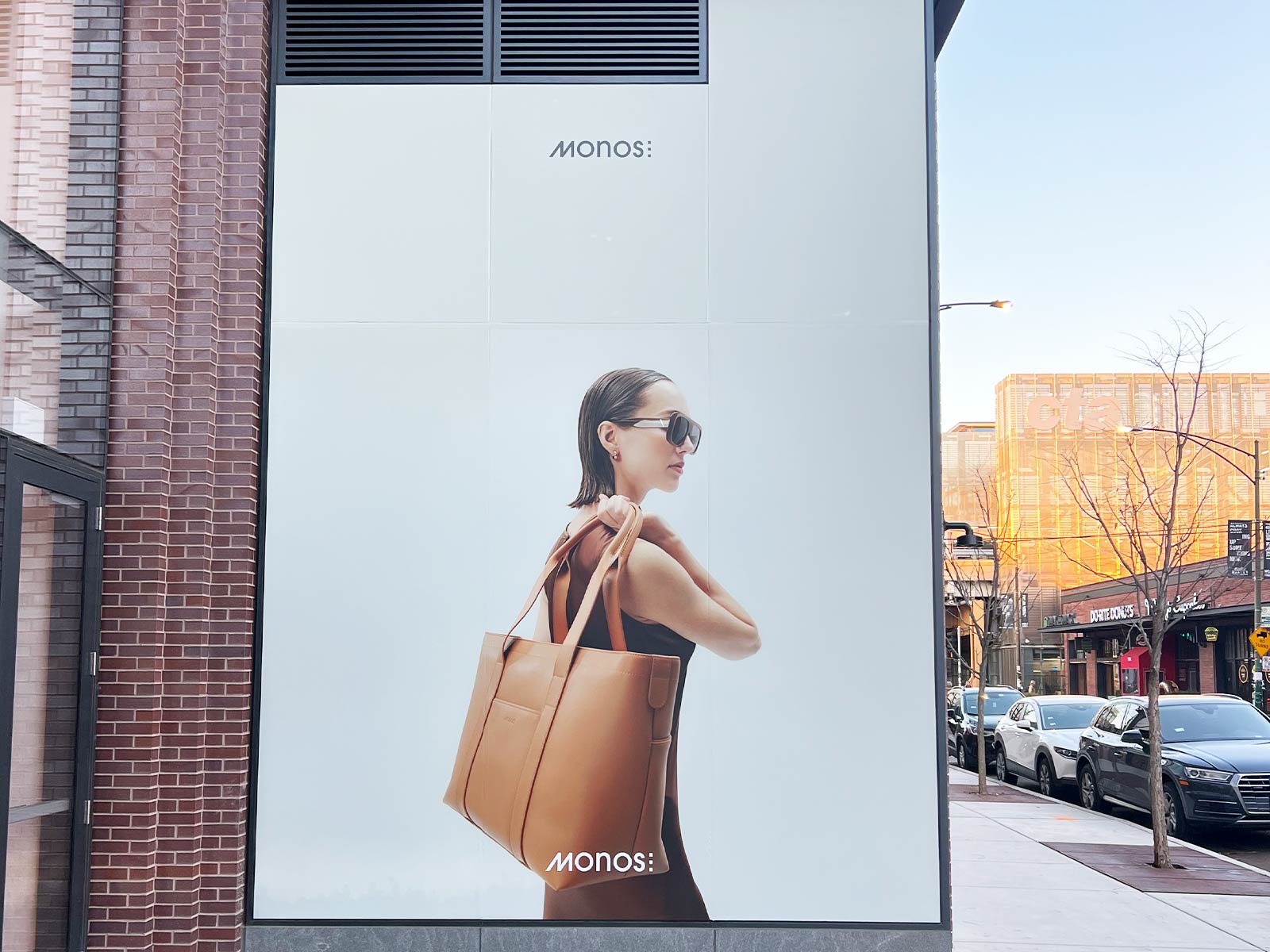 Stunning Success: Massive Vinyl Window Graphics Transform MONOS Stores Nationwide 3 printed window vinyl installed chicago
