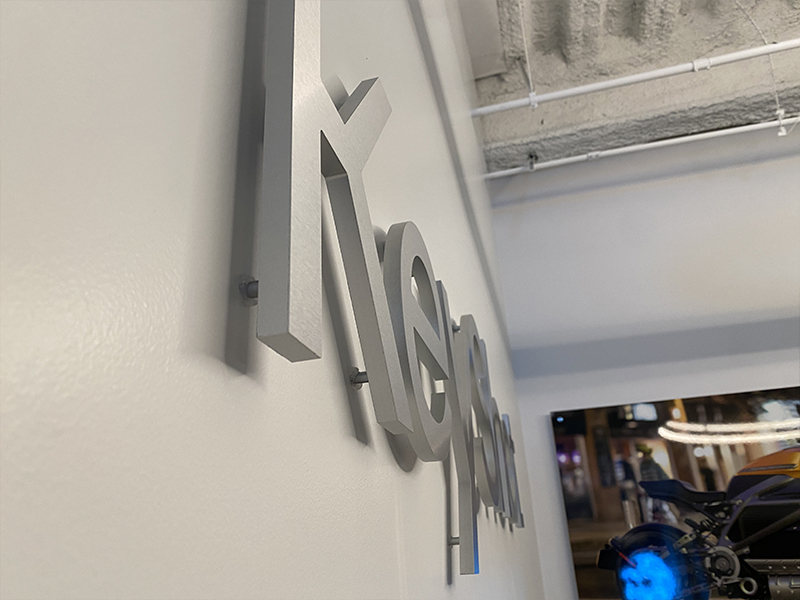 Elevate Your Brand with Custom Raised Letter Signs 2 raised metal router cut letters for lobby sign