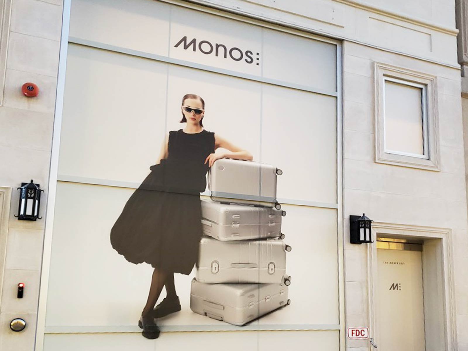 Stunning Success: Massive Vinyl Window Graphics Transform MONOS Stores Nationwide 5 window vinyl installed boston